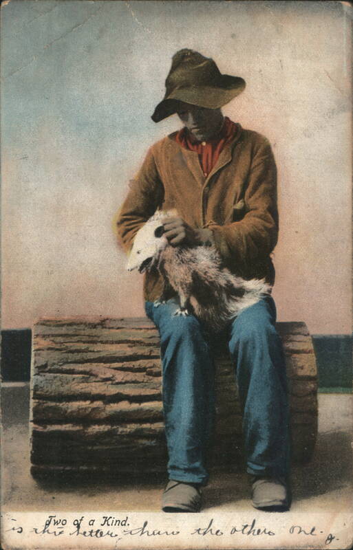 Hand-colored man with opossum, 'Two of a Kind' caption