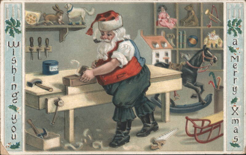 Santa Claus in Workshop Making Toys, Wishing You a Merry Xmas