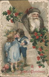 Children Kissing, Santa Claus, Holly, Mistletoe - A Joyful Christmas Postcard