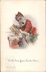 Santa Claus coming down chimney with toys and pipe, 'With love from Santa Claus' Postcard