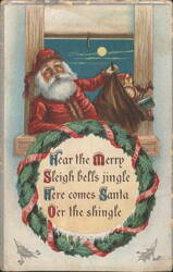 Santa Claus at Window with Toy Sack, Christmas Wreath, 'Sleigh bells jingle' Postcard