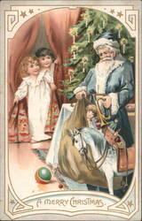 A Merry Christmas: Santa Claus with Children and Toys by Tree Postcard