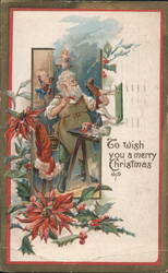 Santa Claus in Workshop Painting Bird with Toys, Poinsettias, Holly Postcard
