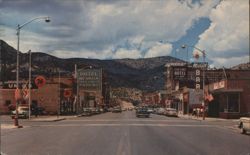 Ely, NV Main Street, Hotel Nevada, Midget Bar, Mountains Postcard