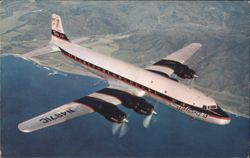 Delta C & S Airline DC-7 flying over coast Postcard