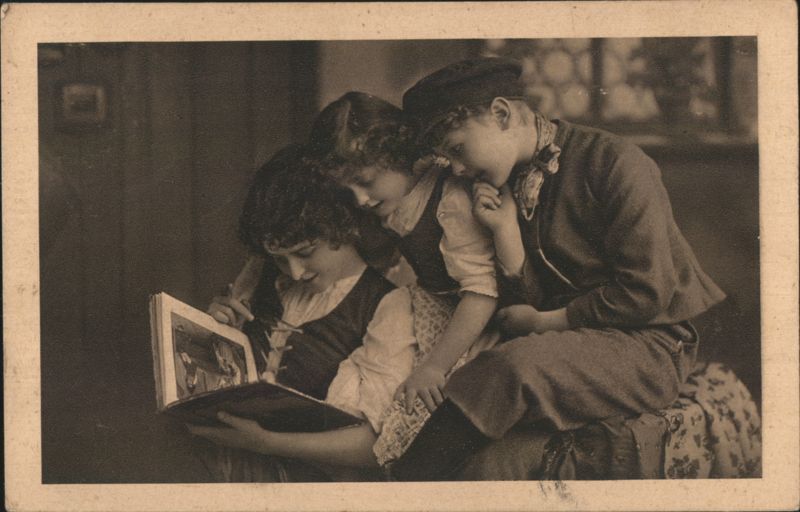 Three Children Reading a Book