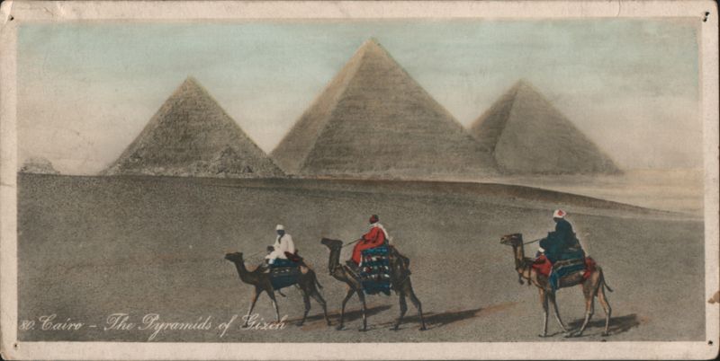 The Pyramids of Gizeh, Cairo with Camel Riders Egypt