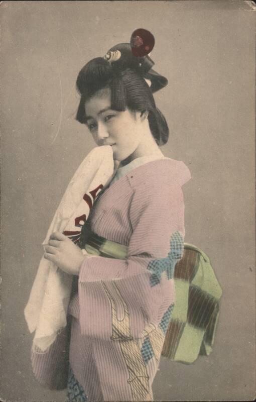 Japanese Woman in Kimono with Elaborate Hair and Red Ornament