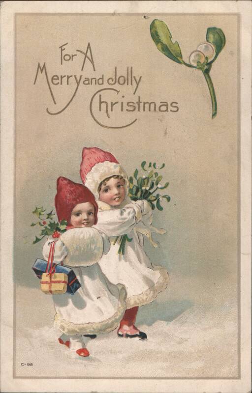 Children with Mistletoe and Gifts in Snow for Christmas