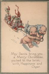 Kewpies Pulling Sleigh with Christmas Presents Postcard