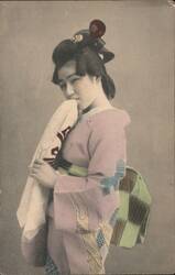 Japanese Woman in Kimono with Elaborate Hair and Red Ornament Postcard