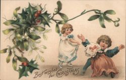 Best Wishes for Christmas with Children, Holly, and Mistletoe Postcard