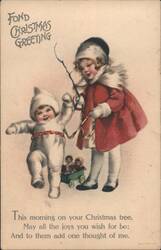 Fond Christmas Greeting with Girl, Baby, and Tree Branch Postcard