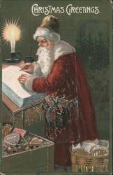 Santa Claus Writing Christmas Greetings by Candlelight at Desk Postcard