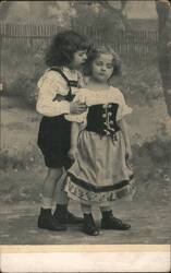 Boy Kissing Girl in Traditional European Costumes Postcard