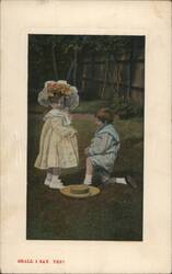 Children in Garden, Boy Kneeling with Hat, 'Shall I Say Yes!' Postcard