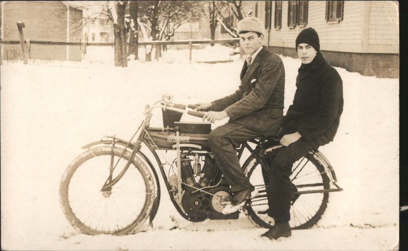 Two Men on Indian Motorcycle in Snow