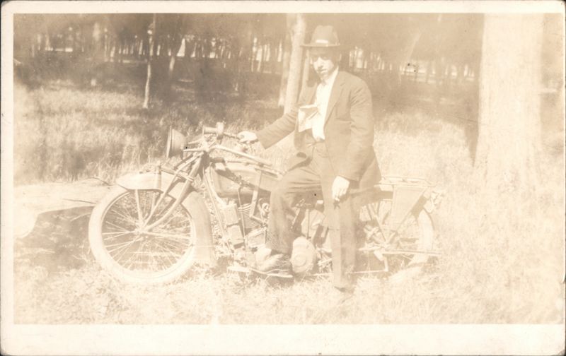Man in Hat & Suit on Excelsior (?) Motorcycle in Woods