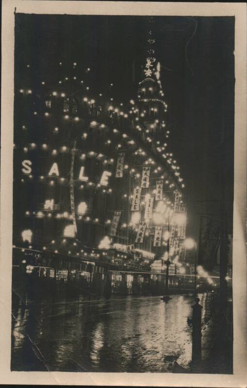 Shanghai Night Street Scene with SALE Signs