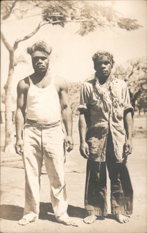 Two Indigenous Men with Headbands and Garlands