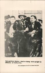 Bob & Grat Dalton Dead/Dying, Held by Officers, Coffeyville Postcard