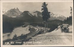 On-Road to Lake Louise, Mountains, River, Car Postcard