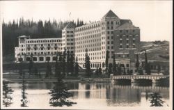 Chateau Lake Louise with Lake and Bridge Postcard