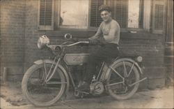 c1910 Young Man on Pope Motorcycle in Front of Brick Building Postcard