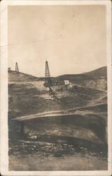 Oil Derricks on Hilly Terrain Postcard
