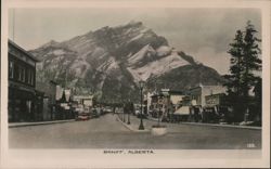 Banff Street Scene with Mountain Postcard