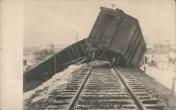 ERIE Boxcar Derailment on Snowy Tracks, Winter Scene Postcard
