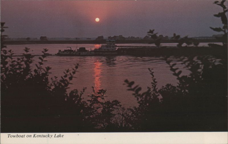 Sunrise on Kentucky Lake with Towboat