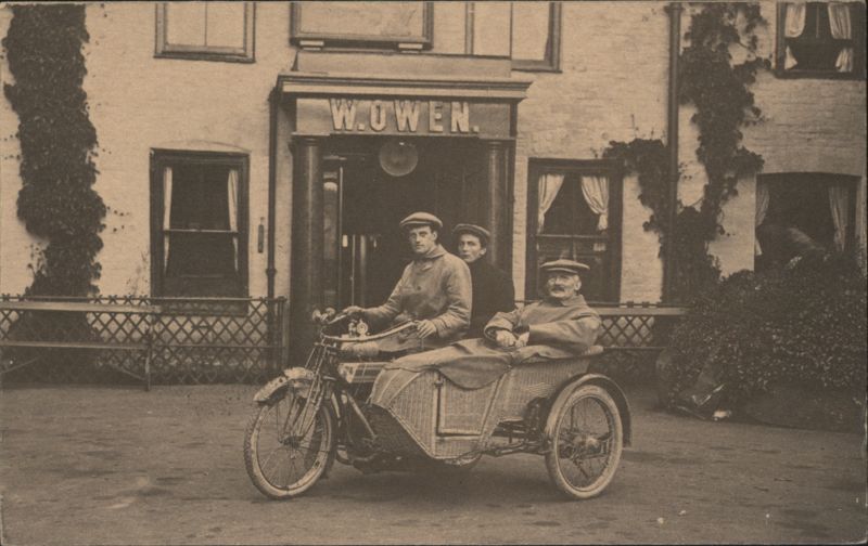 Men with Motorcycle and Woven Sidecar in front of W. Owen Wales