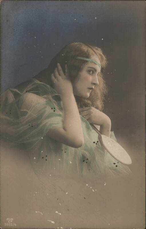 Glamour Portrait of Woman with Mirror