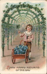 Boy with Cart of Blue Flowers, Four-Leaf Clover, Many Happy Returns Postcard