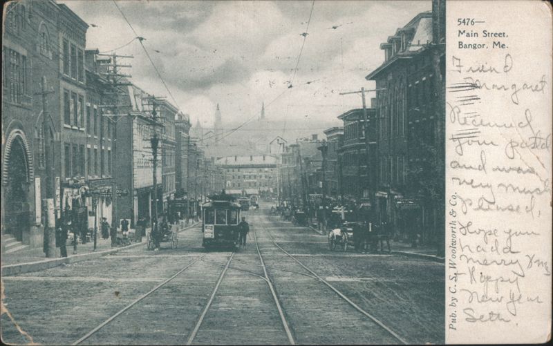 Main Street with Trolleys and Businesses Bangor Maine