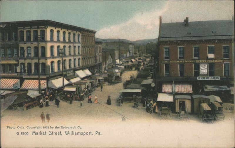 Market Street Scene with Huber's Pharmacy & Tailor Shop Williamsport Pennsylvania