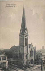 Grace Church with Tall Spire and Clock Tower Postcard
