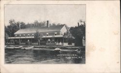 Lakewood Inn and Rowboats on the Water Postcard