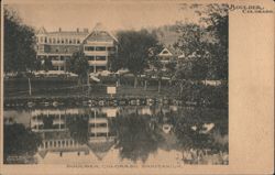 Boulder Colorado Sanitarium with Water Reflection Postcard