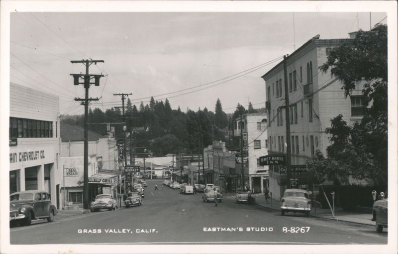 Street Scene with Bret Harte Inn and Chevrolet Co. Grass Valley California