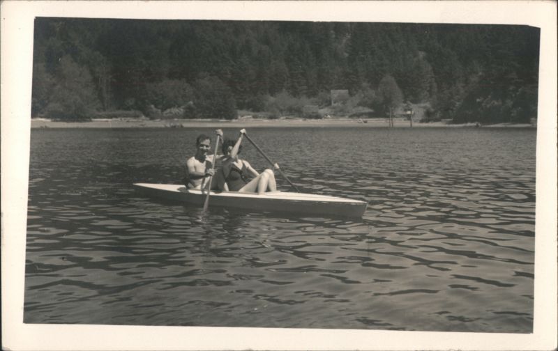 Grace and Jim Rowing a Boat at Grindstone Bay Nanaimo BC Canada