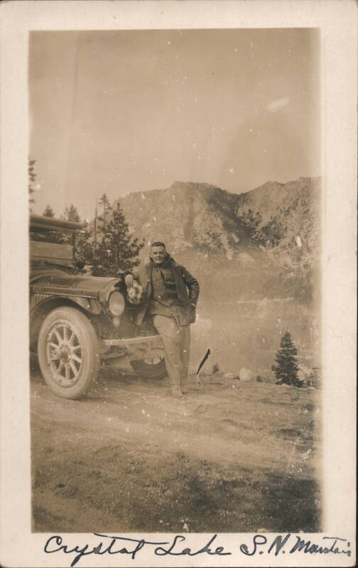 Man Leaning Against Automobile at Crystal Lake California
