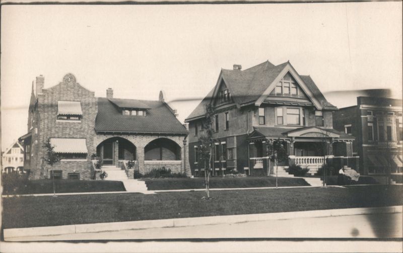 Two Large Brick Houses Buildings