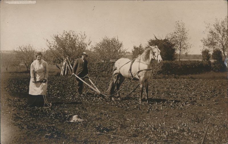 Man and Woman Plowing Field with Horse Farming