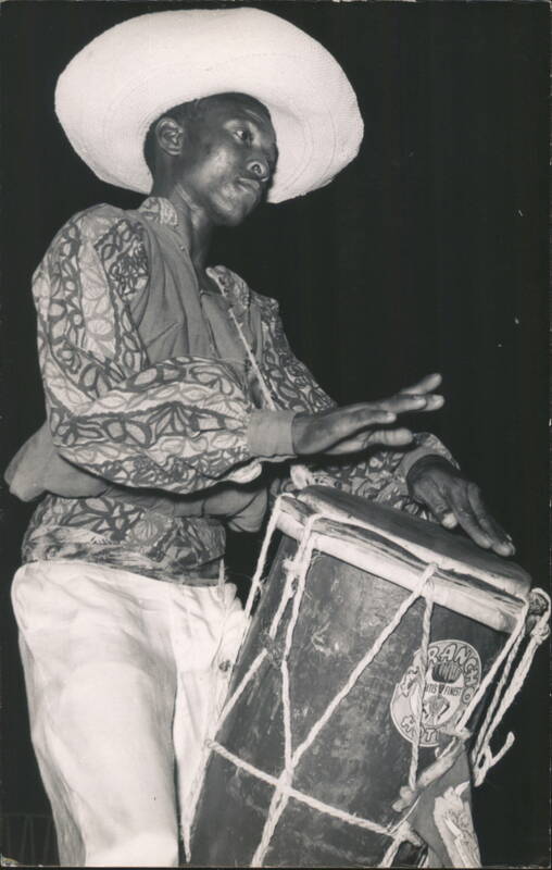 Man Playing Drum in Traditional Haitian Attire Caribbean Islands