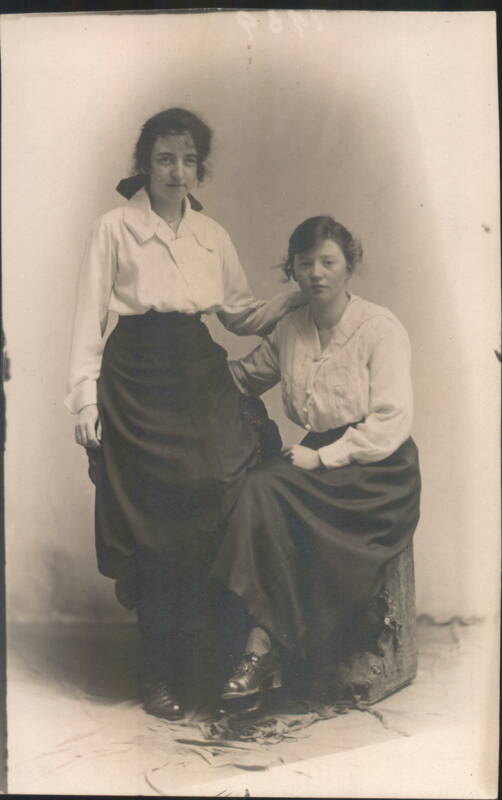 Two Young Women Standing and Sitting for Portrait W. H. Tayler