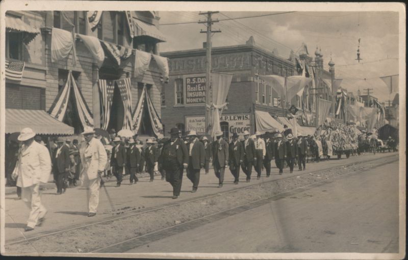 Parade on Main St. at Tracy Ave, Looking East