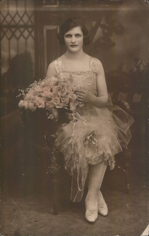 Portrait of a Woman Holding a Large Bouquet of Roses New York