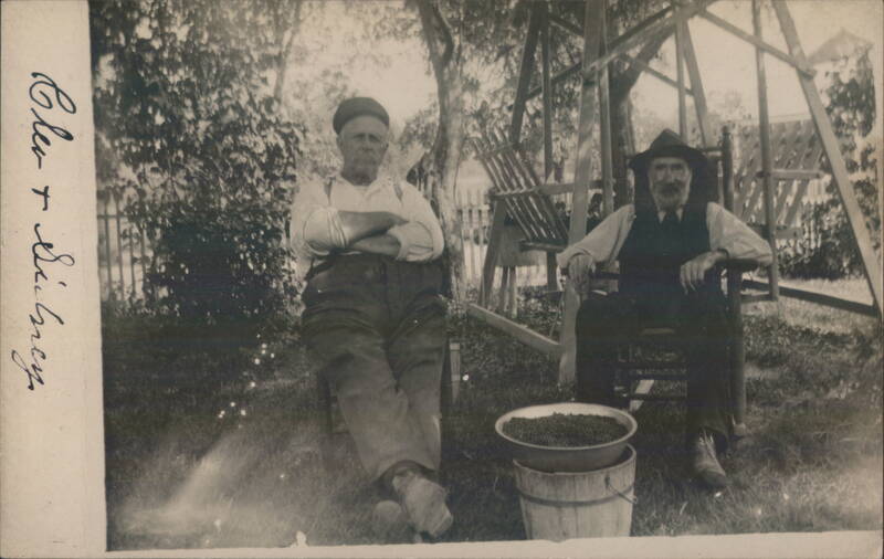 Cleve and Sidney Seated Outdoors Family Portaits
